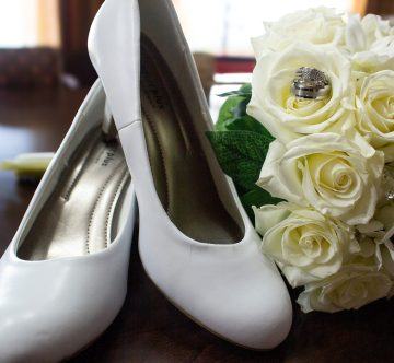 Bride's shoes, flowers, and rings