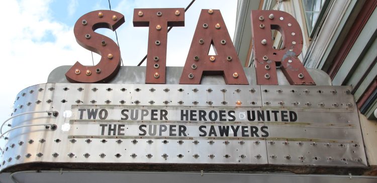 cinema marquee with bride and grooms name on it