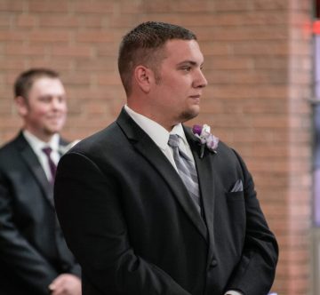 Groom seeing Bride walk down the aisle