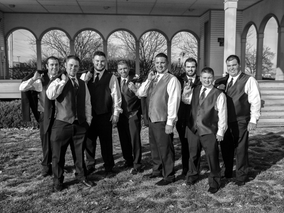 groom and groomsmen in black and white