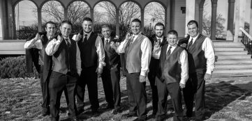 groom and groomsmen in black and white