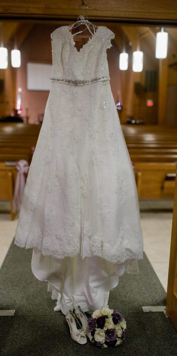 Wedding gown hanging in the entrance to the sanctuary