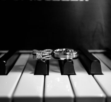 wedding rings on piano keys